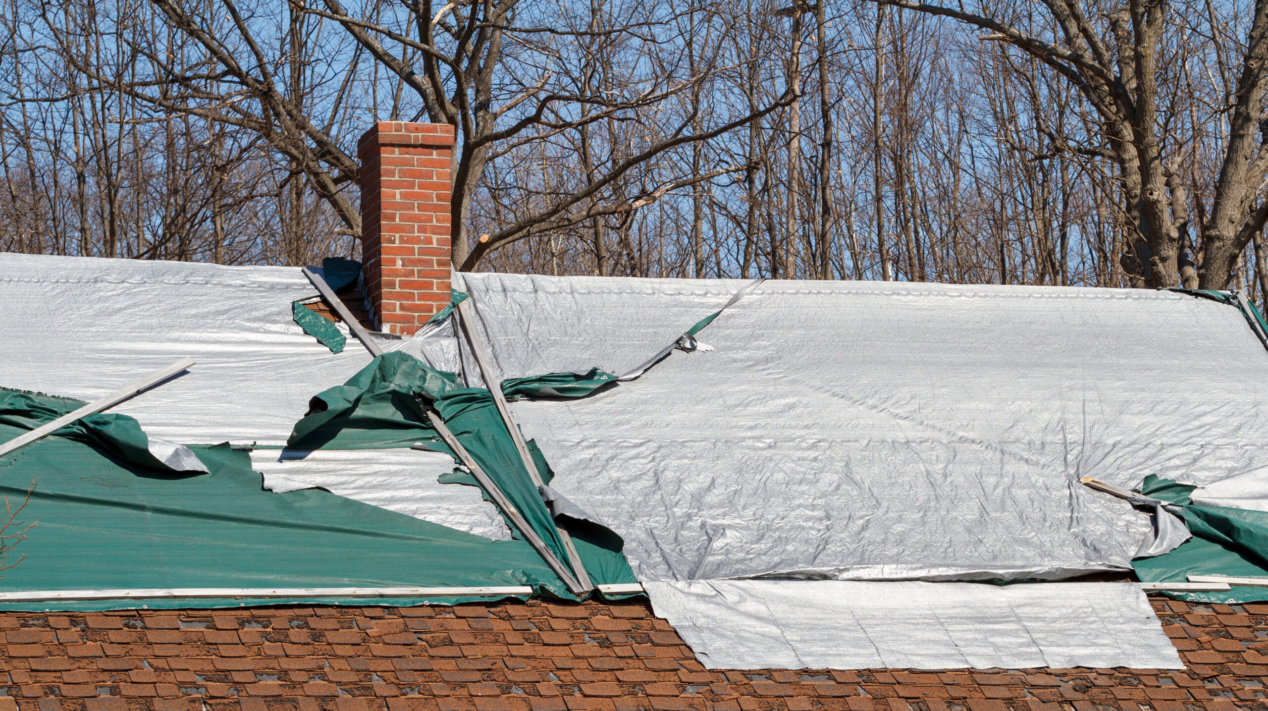 Stacks of yellow ceramic roofing tiles for covering residential
